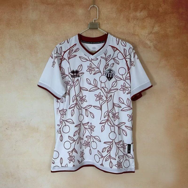 camiseta Castellón 25-26 visitante blanca granate naranjos
